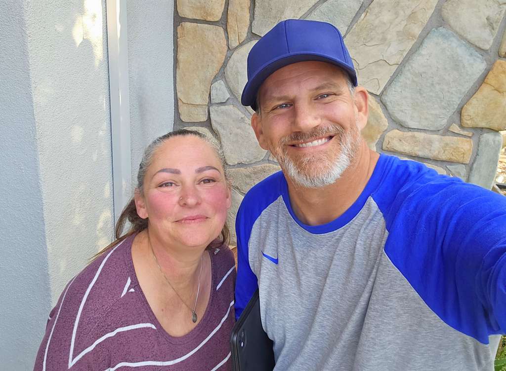 Mark O'Connor with customer Keri